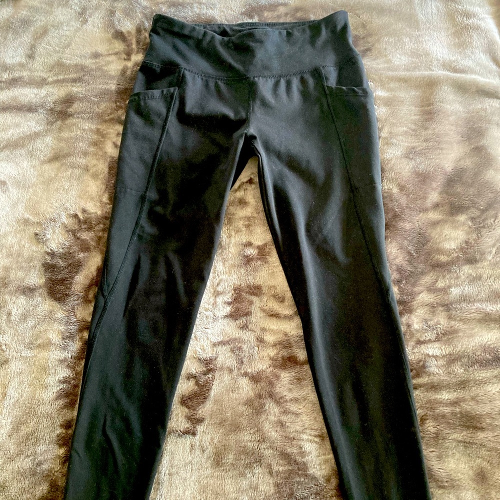 Jockey 7/8 length, black athletic leggings. New condition. Side pockets.